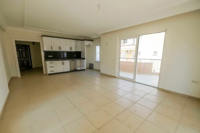 Dvosobni Apartman na Prodaju sa Bazenom u Mahmutlar, Alanya